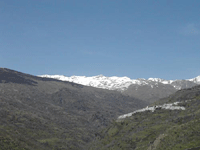 Poqueira valley with snow capped mountains